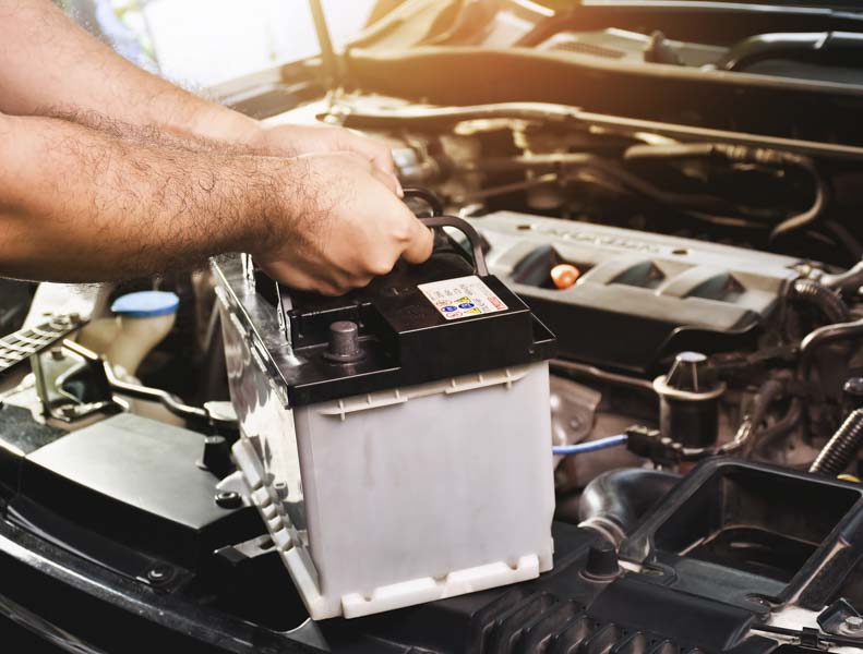 removing a battery to safely clean corrosion